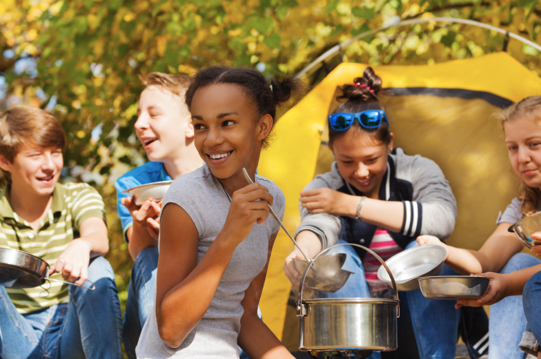 diverse-group-kids-camping-soup